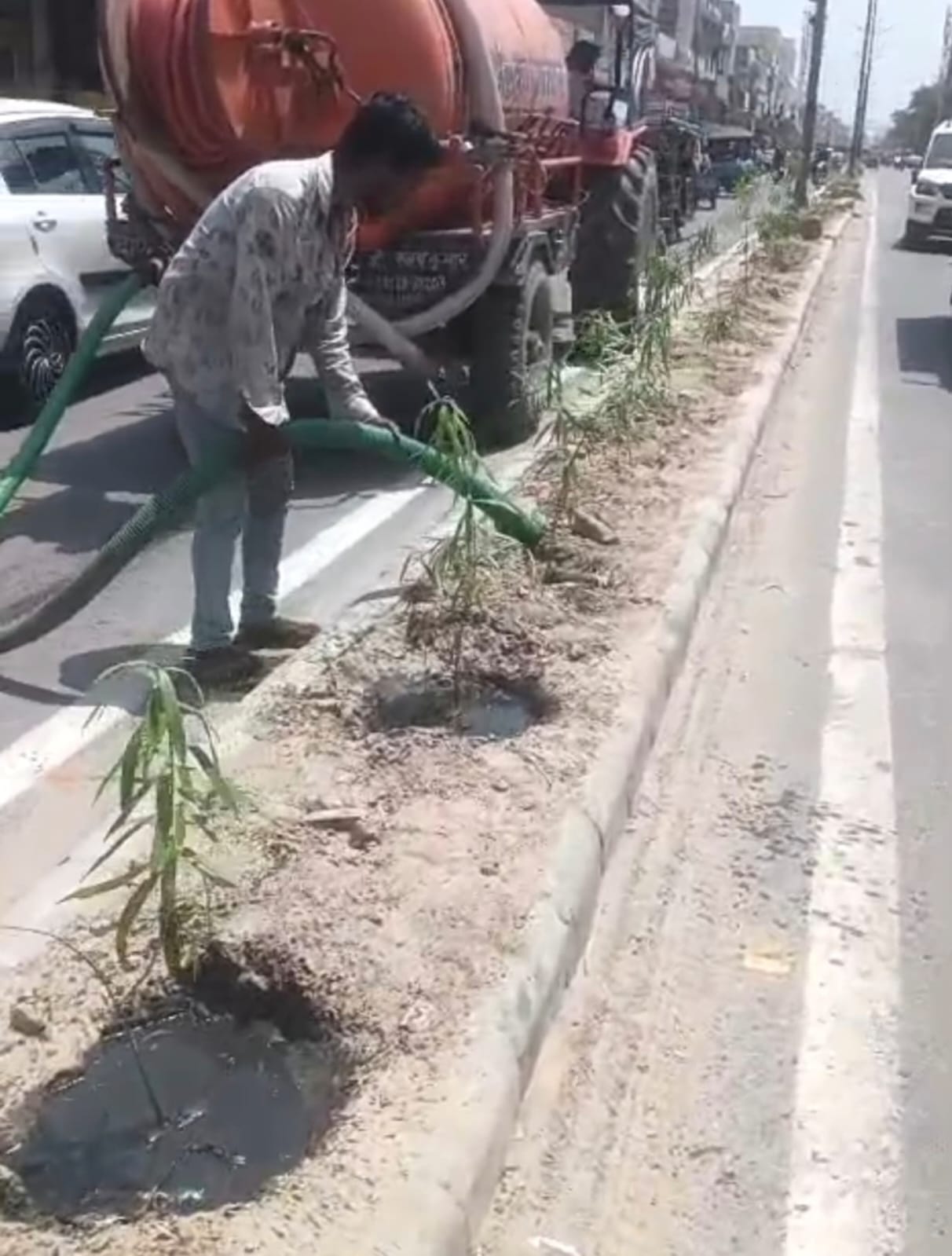 Use of contaminated water for irrigation of plants planted on main roads, protest