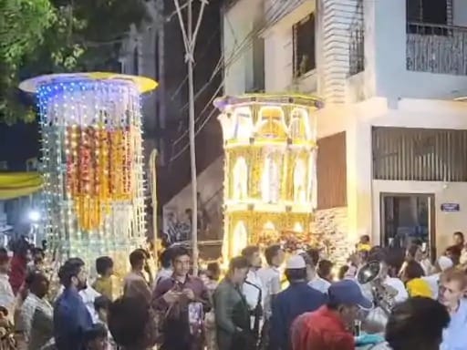 Community members arrived to view the official *Tazia* after the Imambara