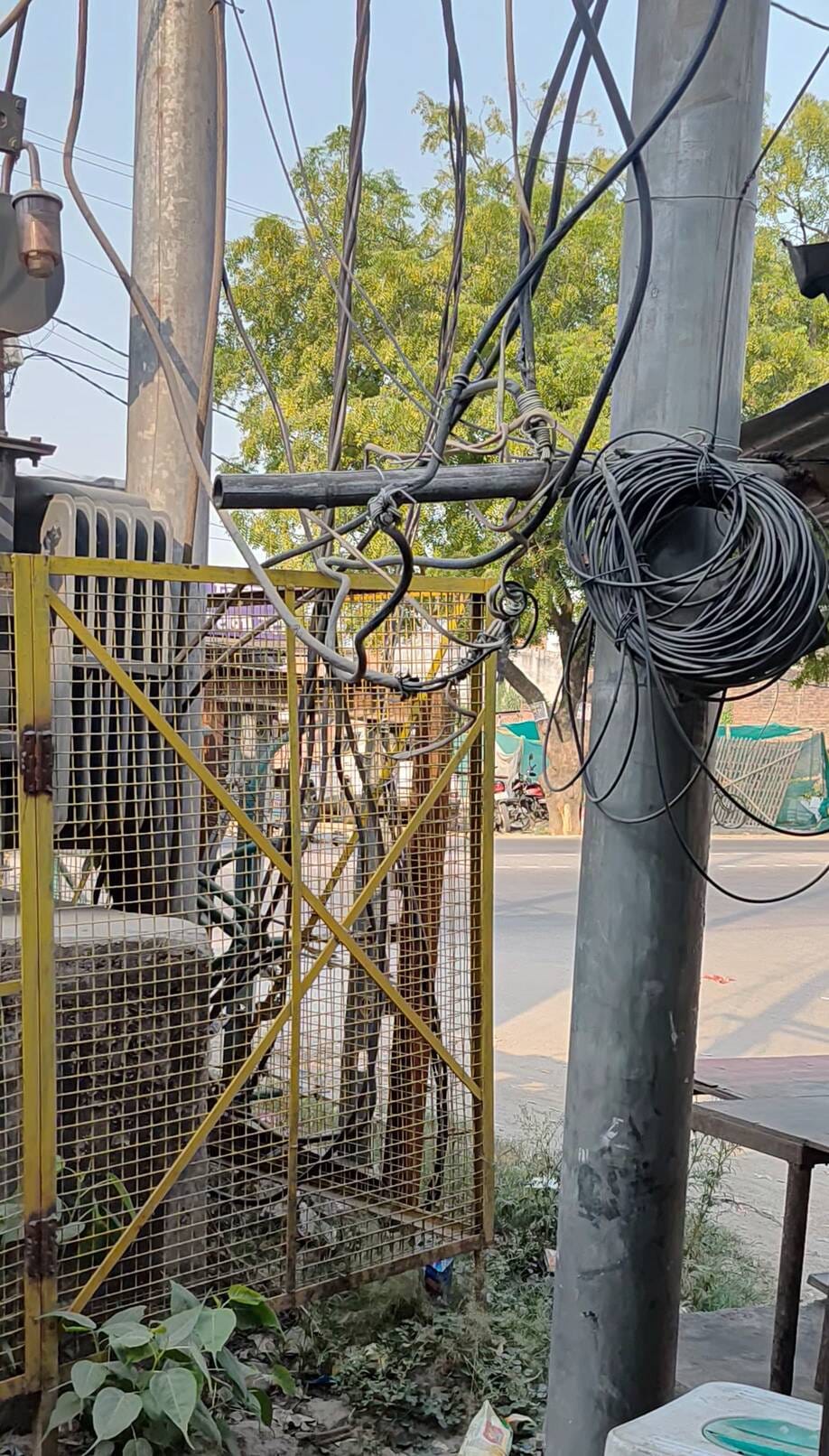 Transformer placed on the ground near the school, risk of accident