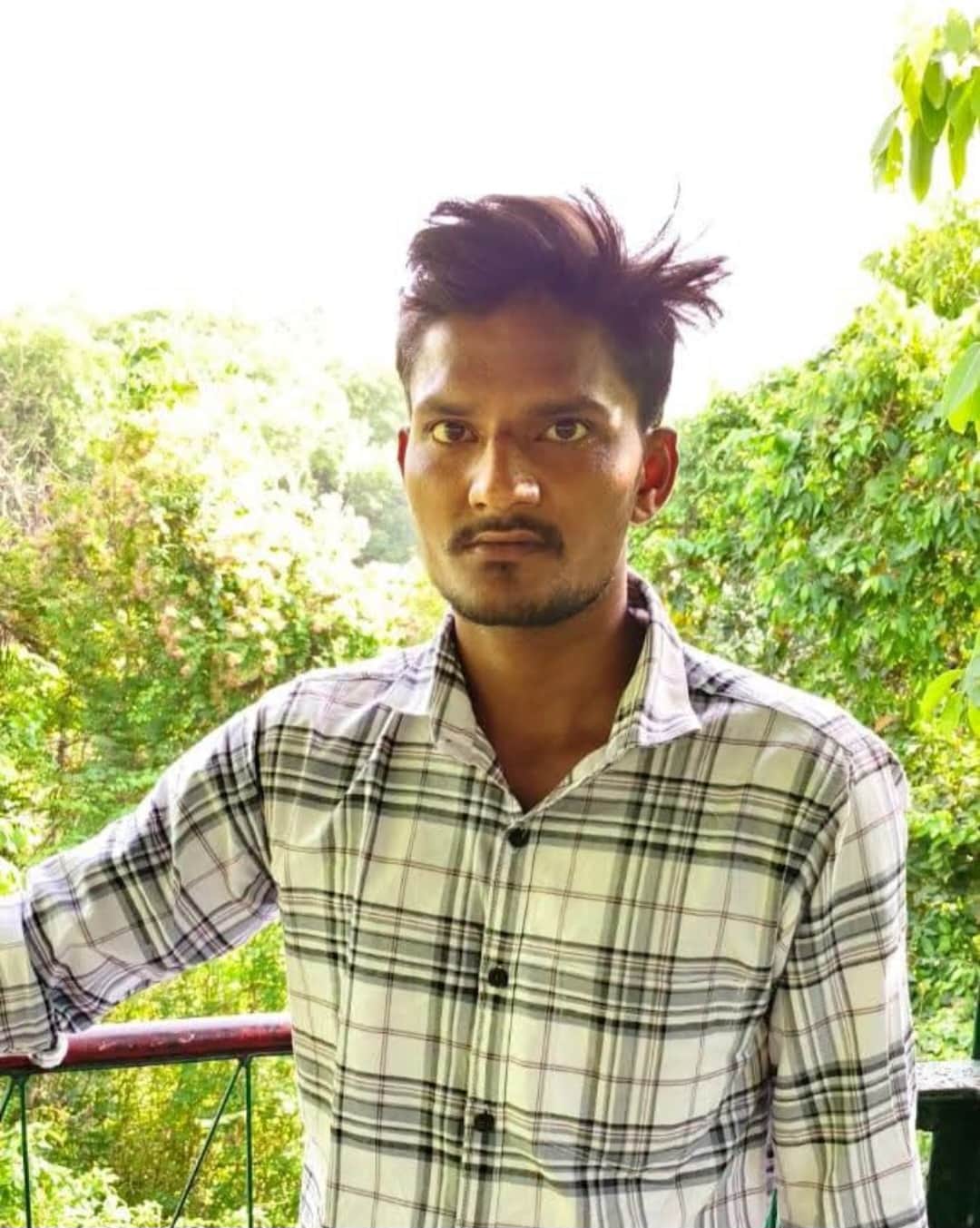 Body of a young man found in a ditch beside the railway track.