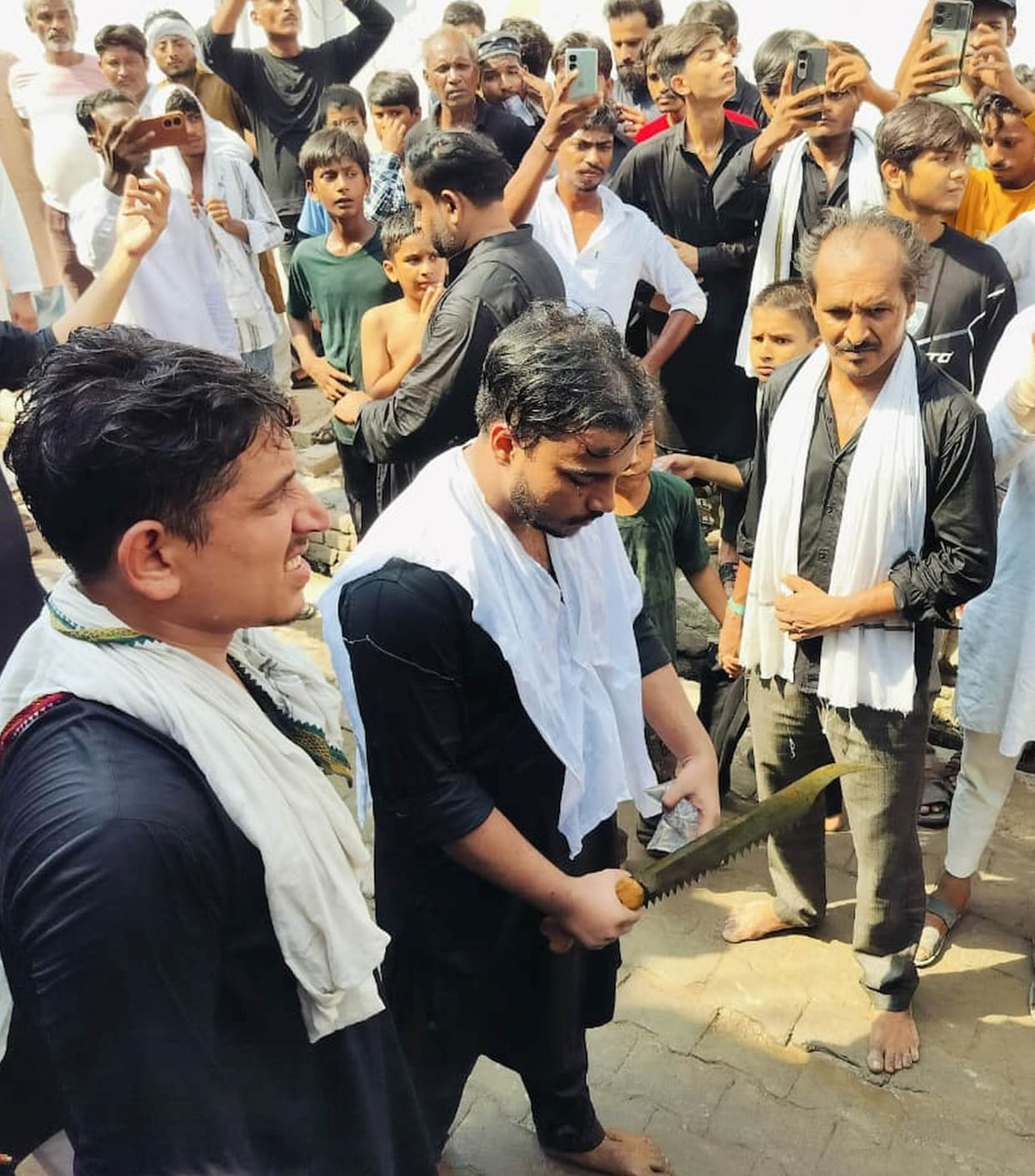 Devotees thronged to witness the Zanjeer mourning procession.