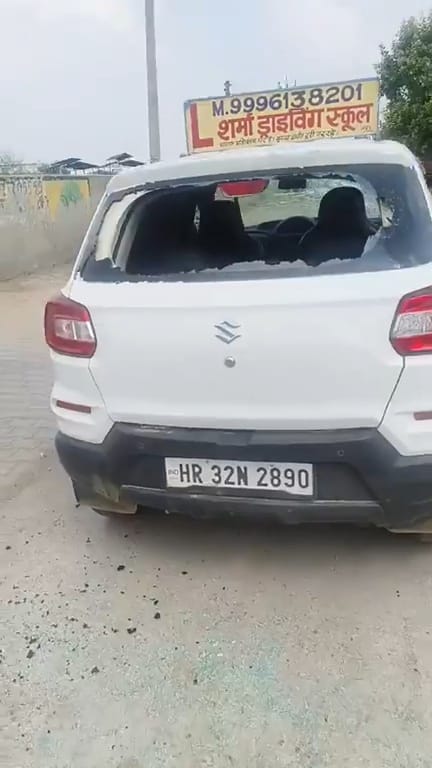Driving school operator's car attacked and damaged