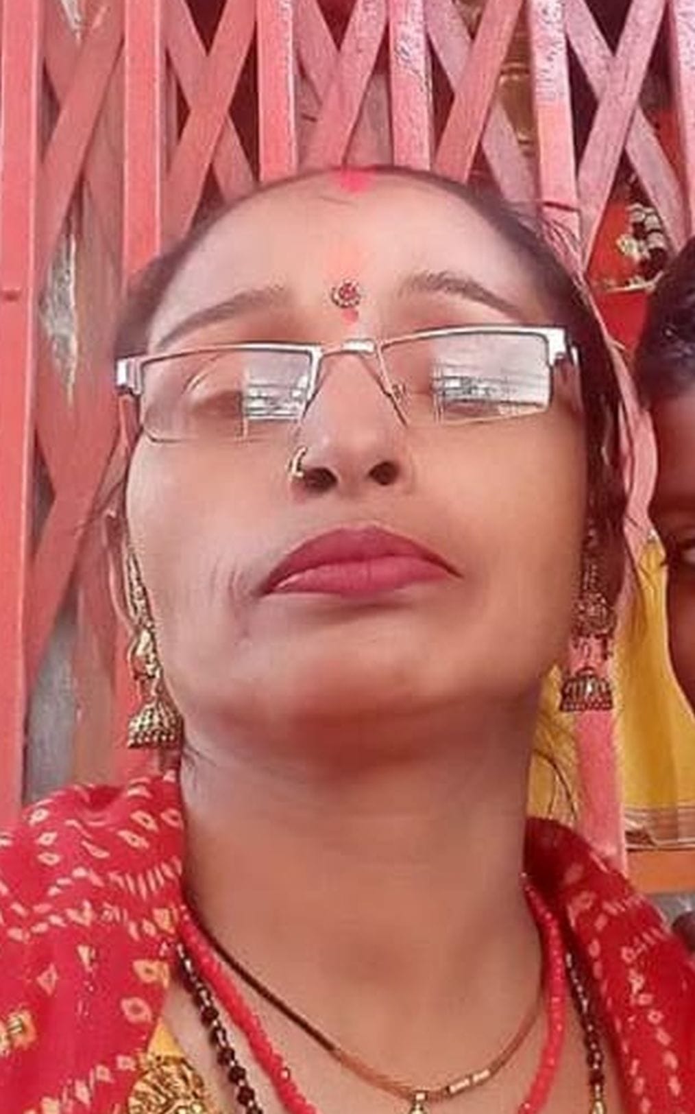 Wife riding a bike dies after collision with vehicle; husband and son injured.