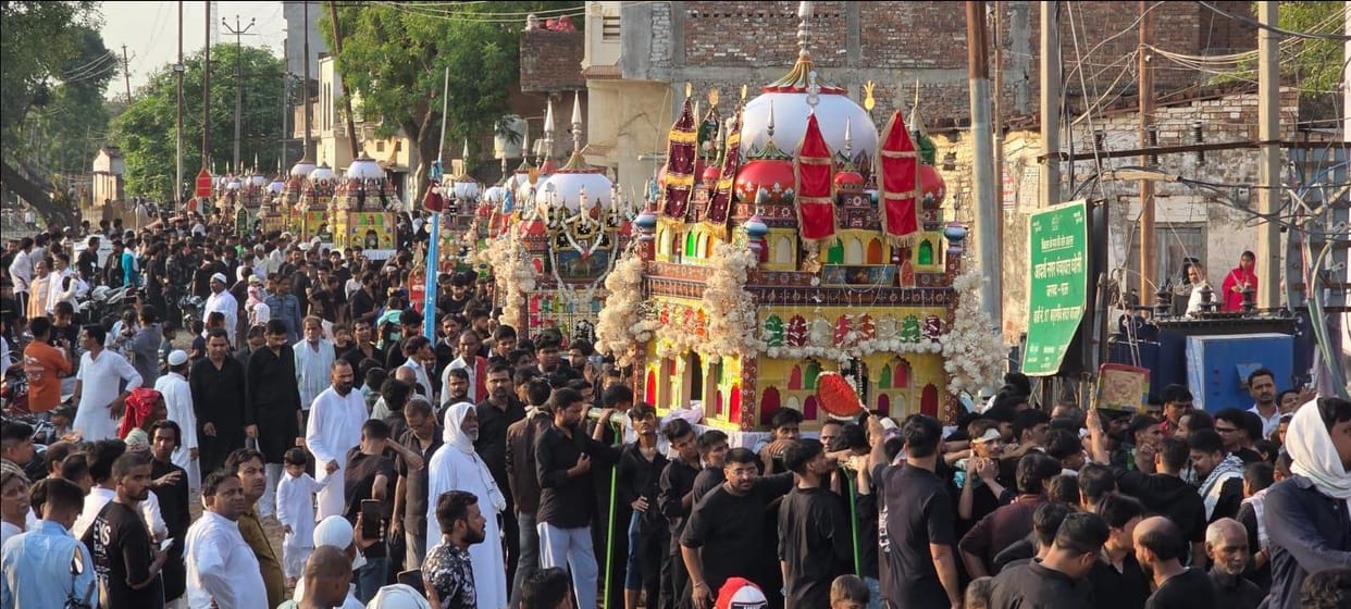 Amidst security arrangements, the Tazia procession was taken out, featuring acts of ritual chest-beating and mourning with chains.