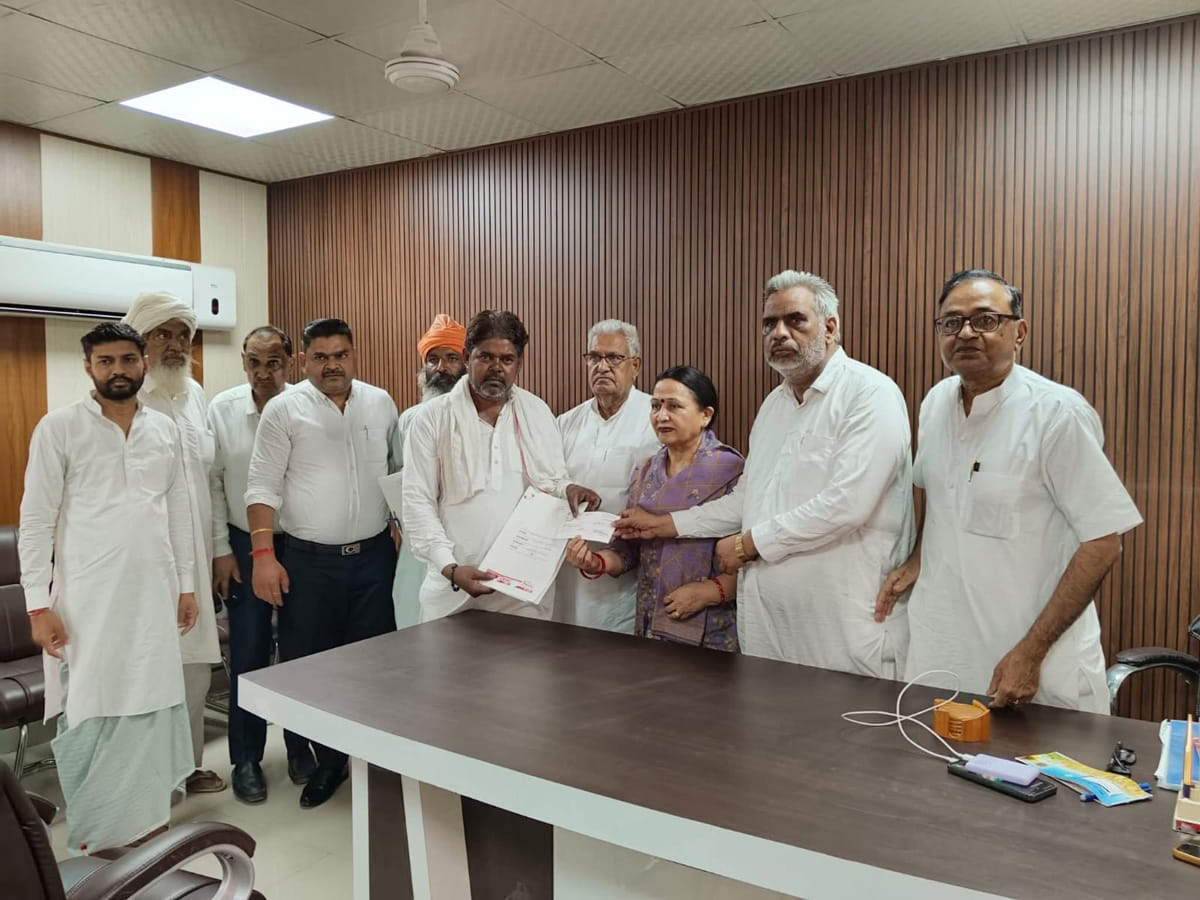 Cheques for financial assistance handed over to affected farmers.