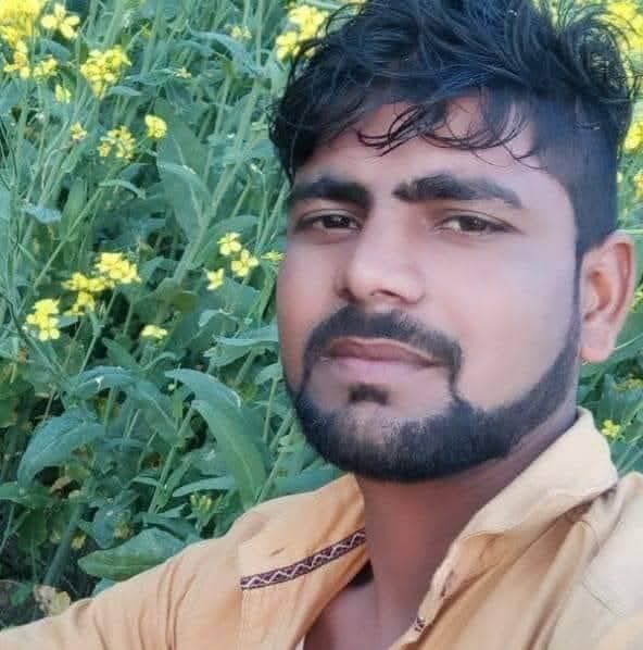 body found hanging in a locked room; murder suspected.