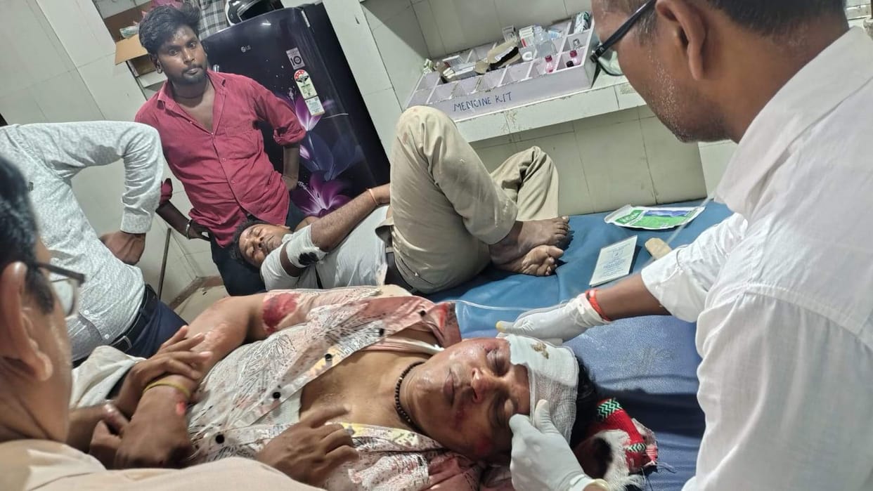 Two railway employees on a bike injured after being hit by a dumper truck.