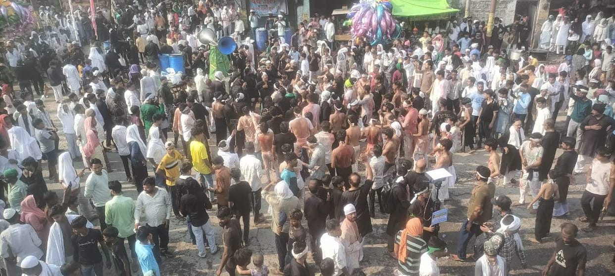 Tazias were lifted from Chowk; chants of "Ya Hussain" echoed.