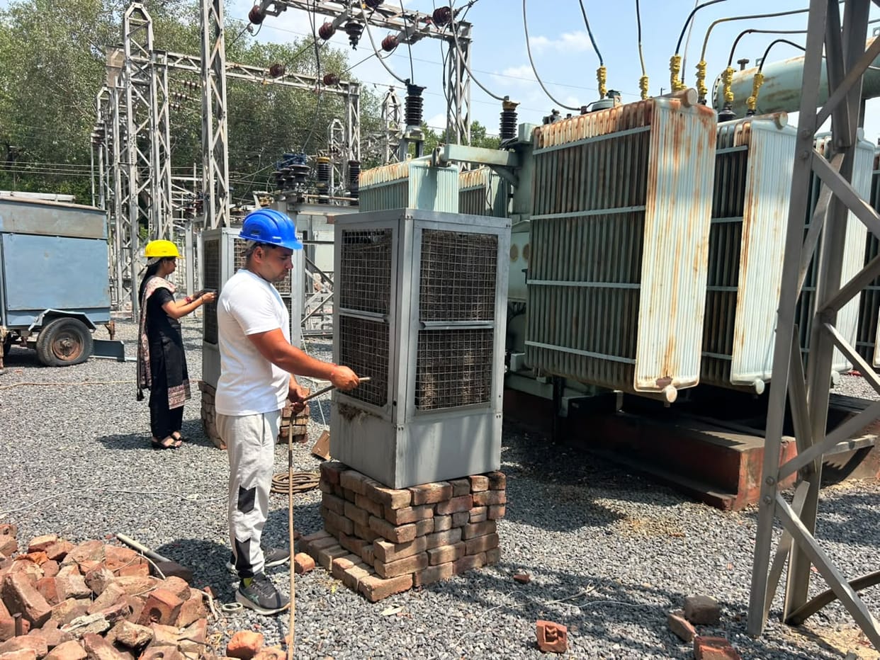 Transformers buckle under scorching heat; power system collapses.