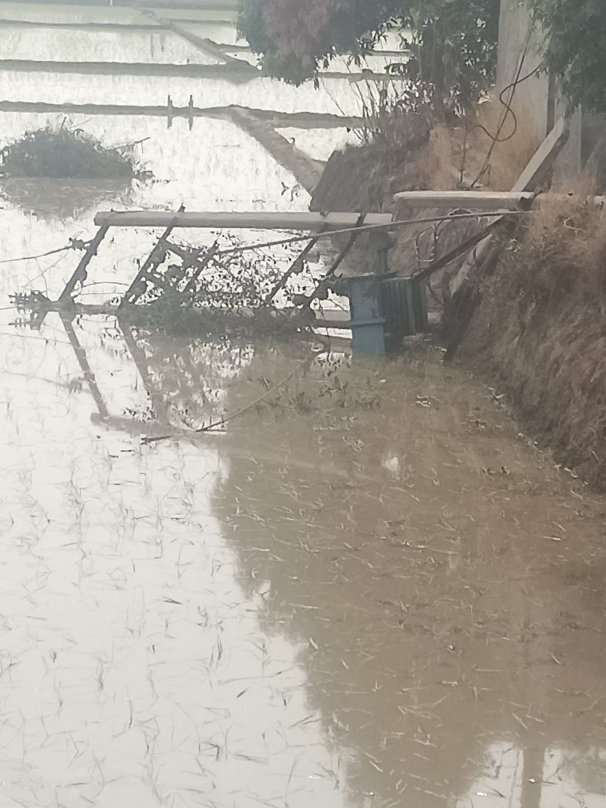 Transformers toppled to the ground due to the storm; power supply disrupted.