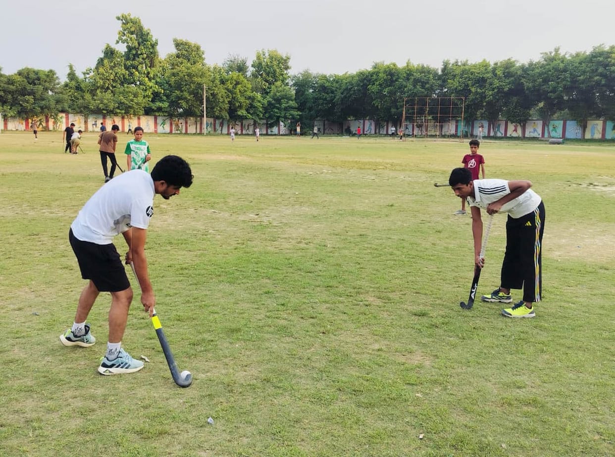 The District Hockey Association team won the match.