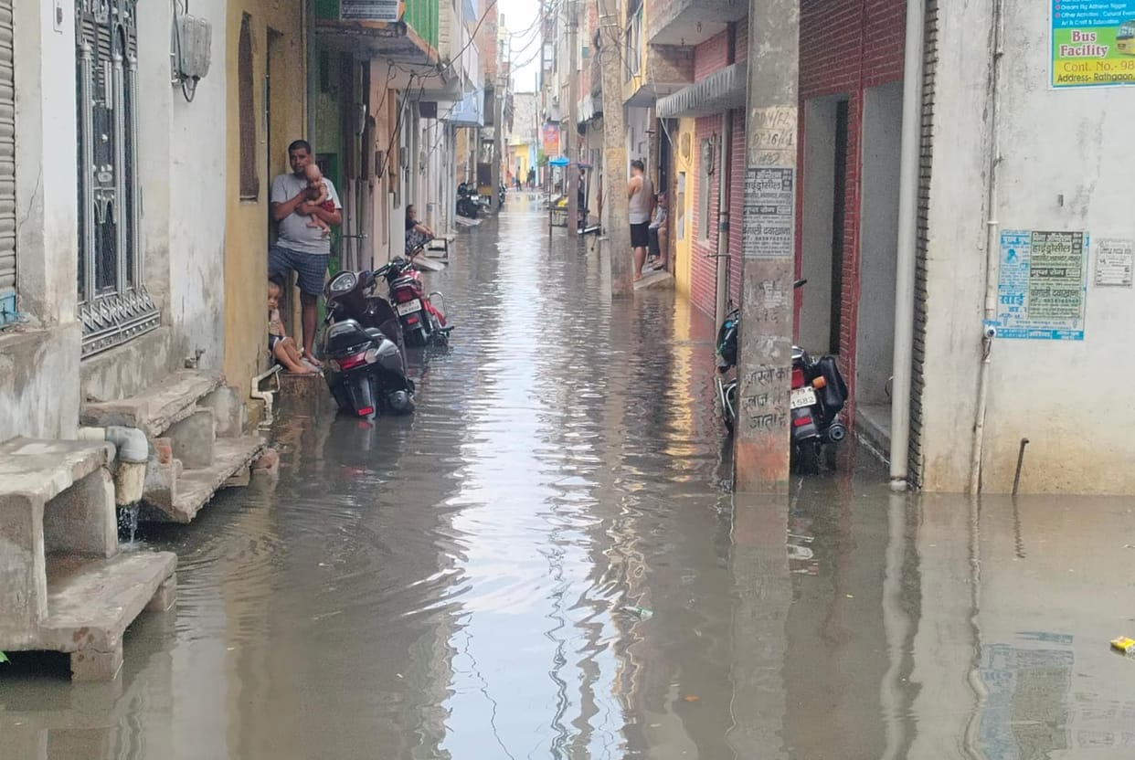 Claims of drain cleaning washed away; just 13 minutes of rain caused waterlogging in streets and neighborhoods.