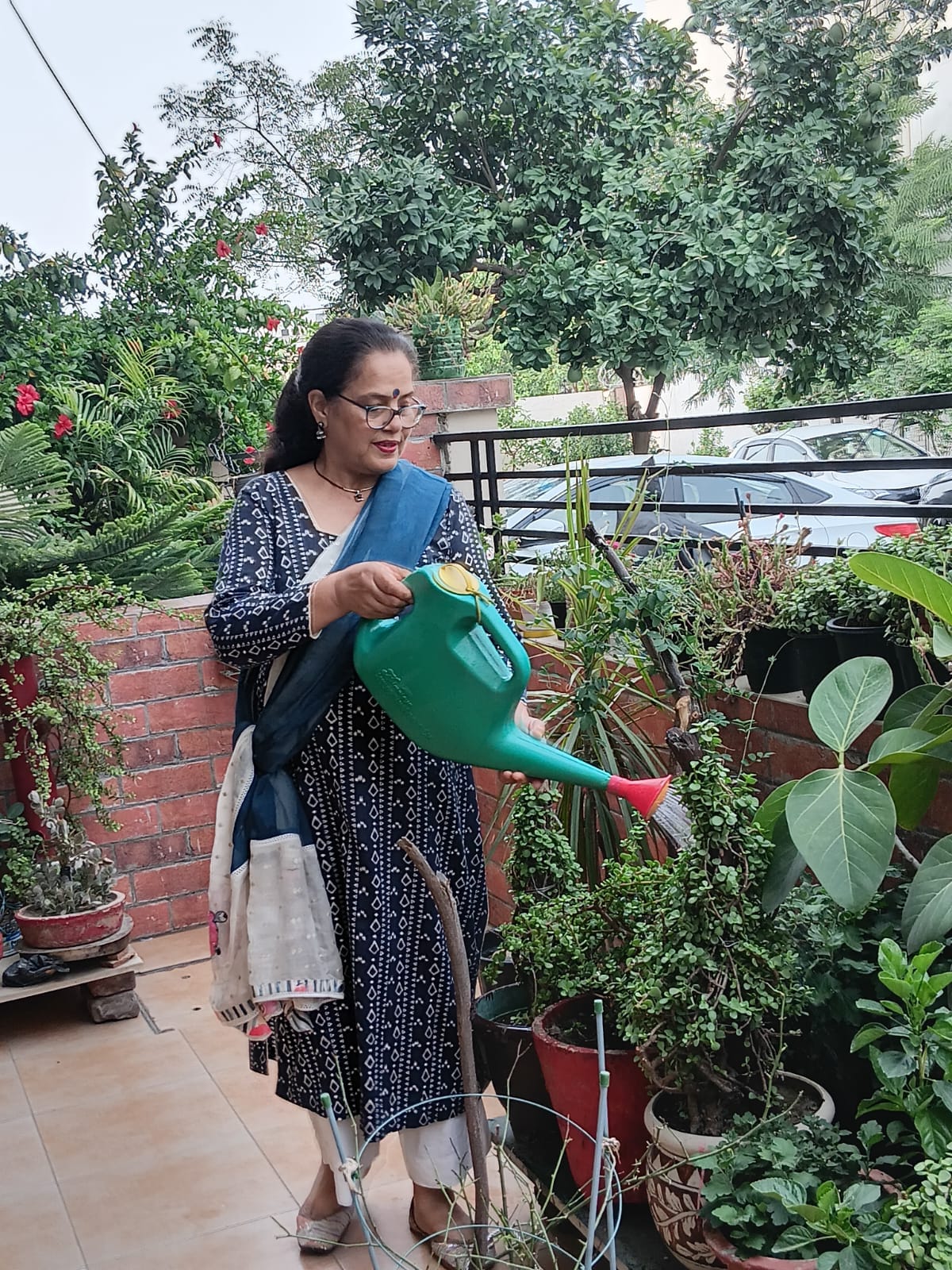 Preserving her mother's legacy through greenery: Rajni Makin has been dedicated to nurturing plants for 25 years.
