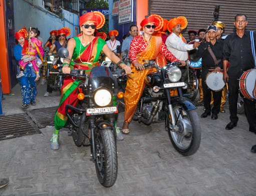 The sky reverberated with the thunderous sounds of Nashik Dhol, the Bullet squad, and the horse and sword contingents.