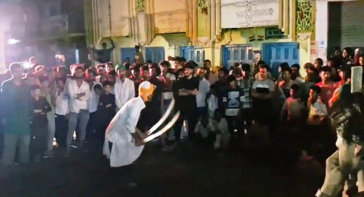 Weapons openly brandished during the Muharram procession in Zamania.