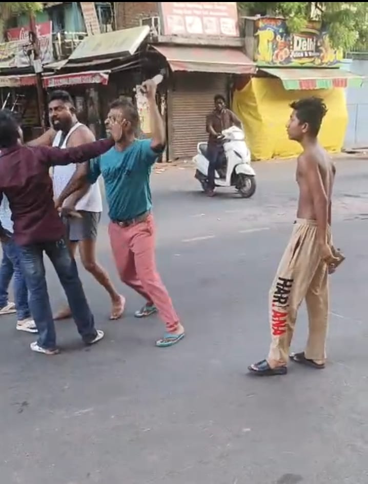 Accusation of attacking a shopkeeper with a chopper