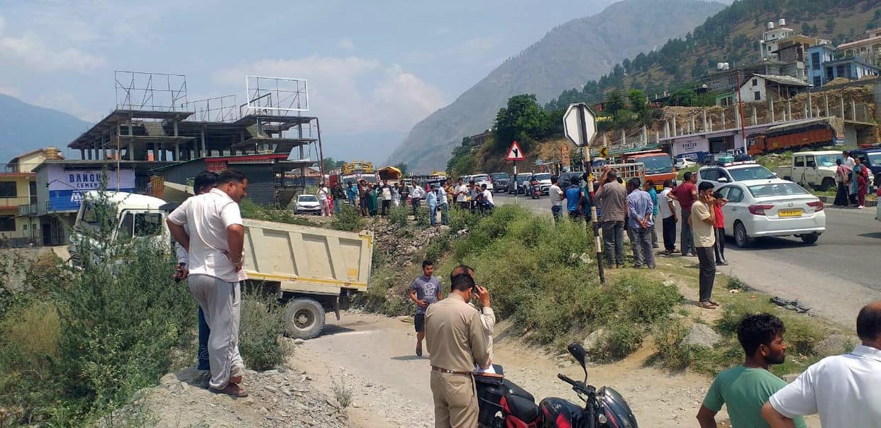 Volvo tipper collision at Bhuntar's Trehan Chowk; driver injured.