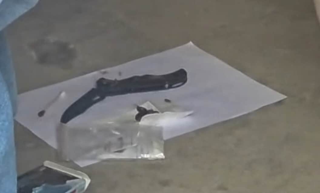 Murder of missing woman; body found in car parked inside the house.
