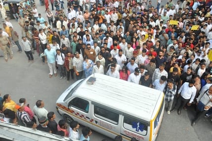 Protest march and gherao of CMO and MS following a woman's death after childbirth.