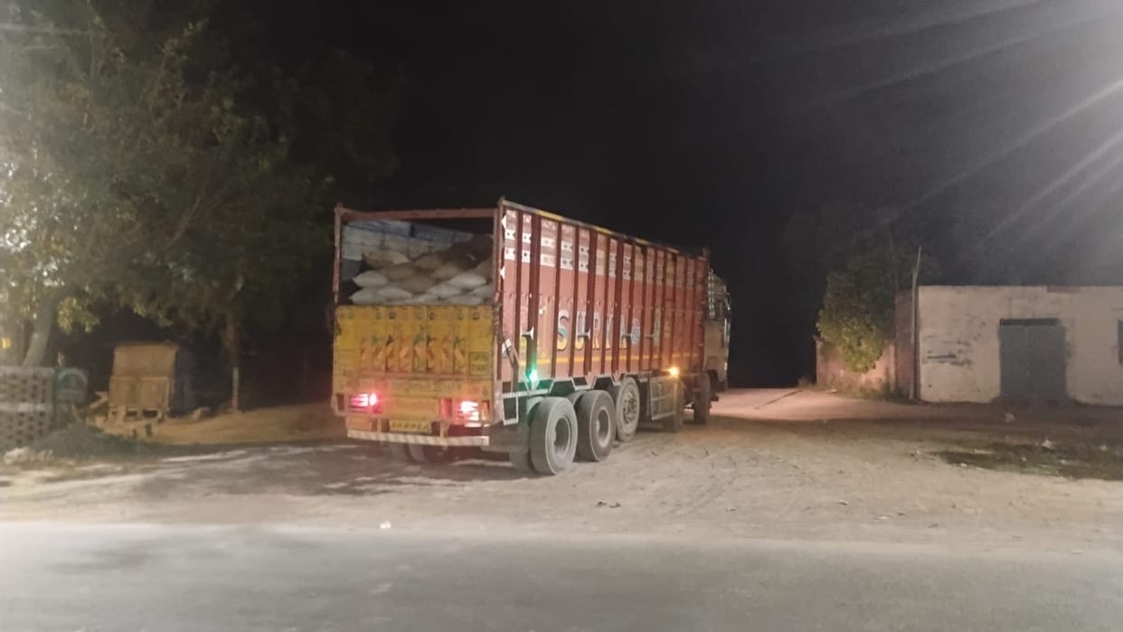 Allegations of loading 245 quintals of wheat from a closed cooperative society at night