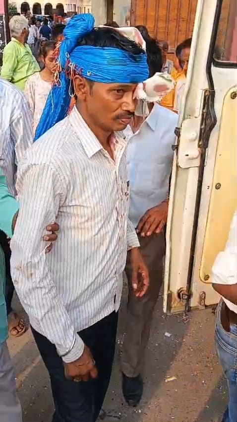 Two groups clash over control of Arya Samaj Mandir; stone-pelting ensues, 12 injured.
