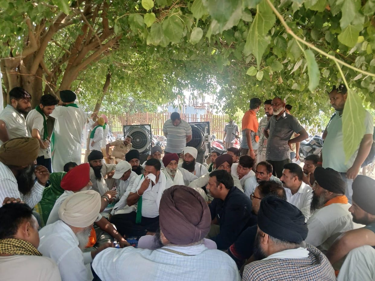 The farmers' protest was postponed after a written assurance from the officials.