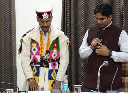 Two councilors arrived in traditional ceremonial attire... Praveen took the oath in Sanskrit.