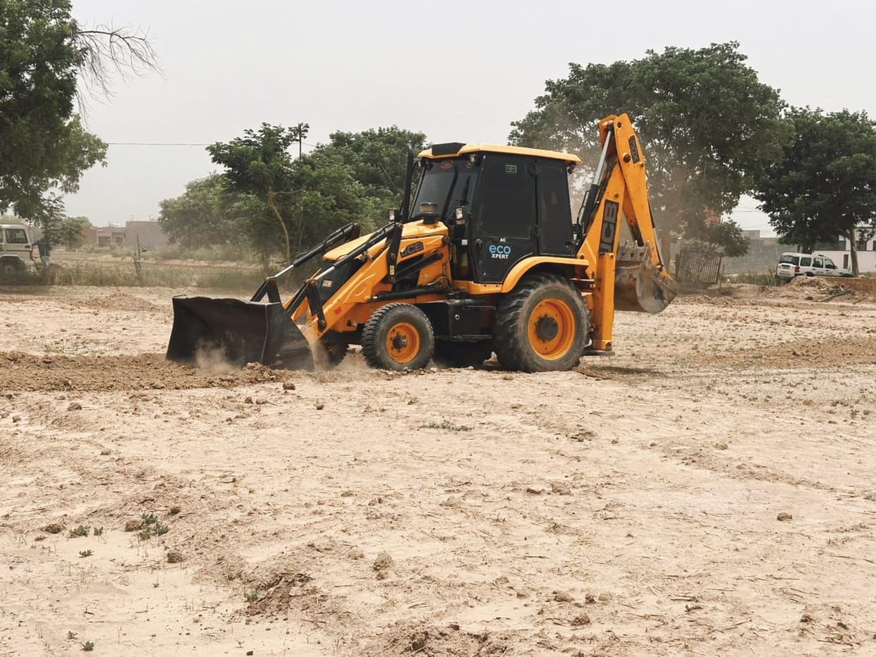 Bulldozers razed an illegal colony and tore up unpaved roads
