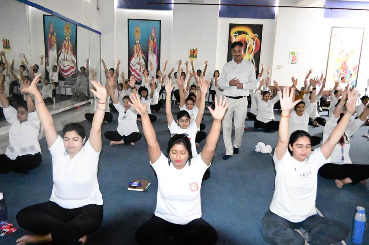 Participants were guided through yoga and meditation practices.