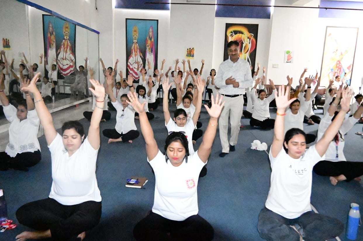 Participants were guided through yoga and meditation practices.