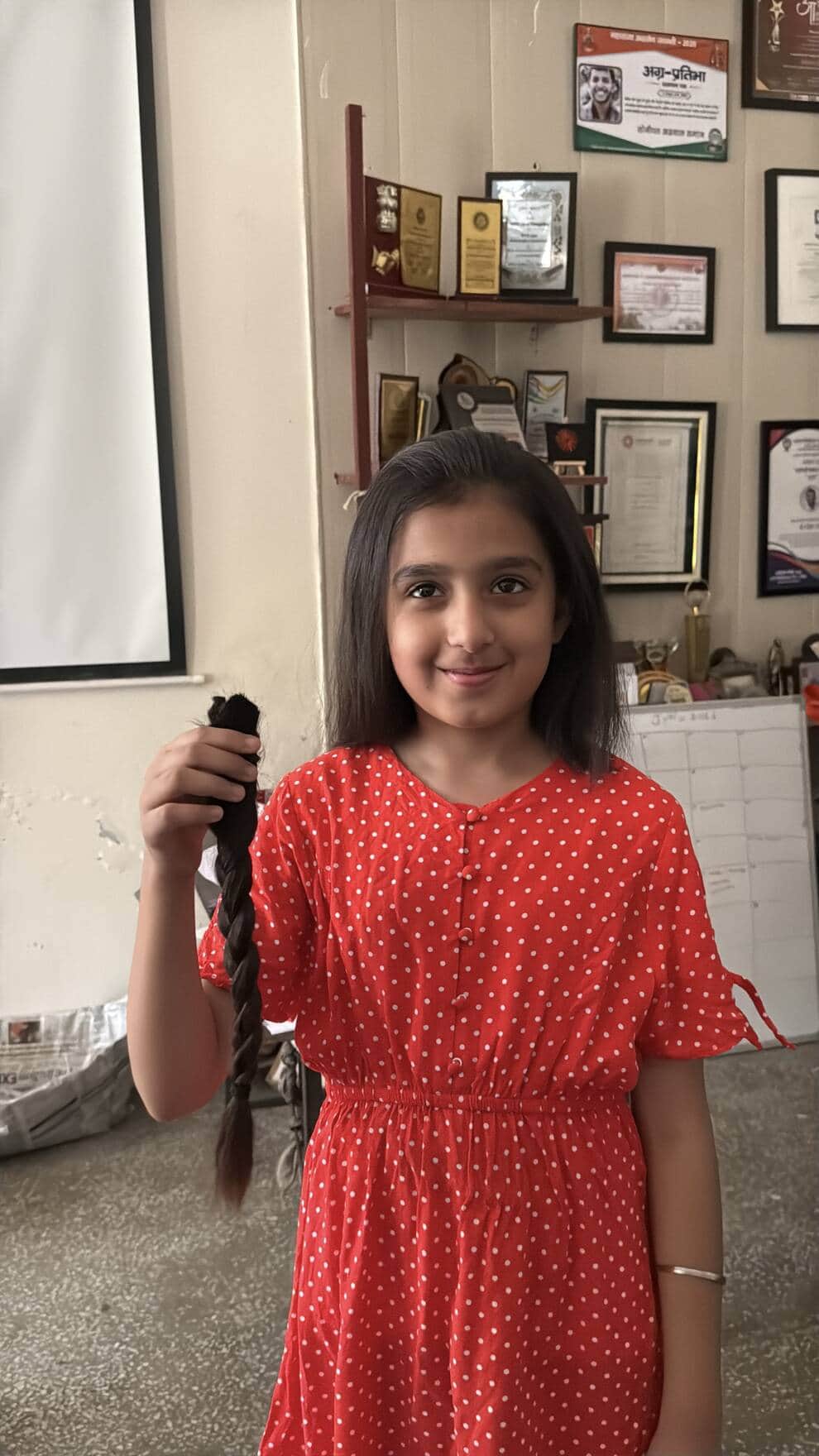 Manya showed compassion by donating 13 inches of her hair for cancer patients.