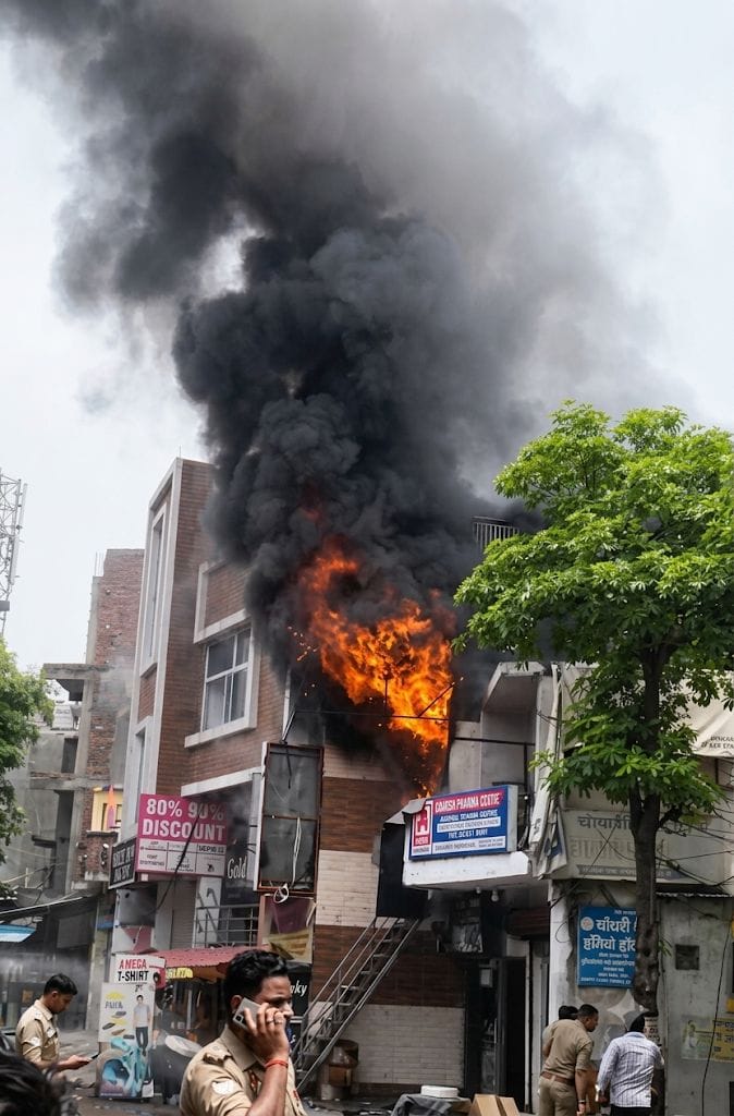 AC compressor explodes; fire breaks out in shoe showroom and warehouse