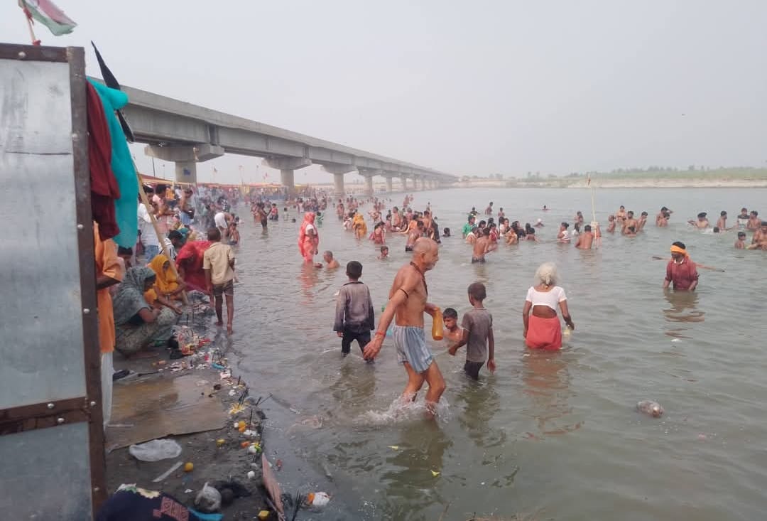 Devotees who arrived at Dhai Ghat on Jyeshtha Purnima took a holy dip in the Ganges.
