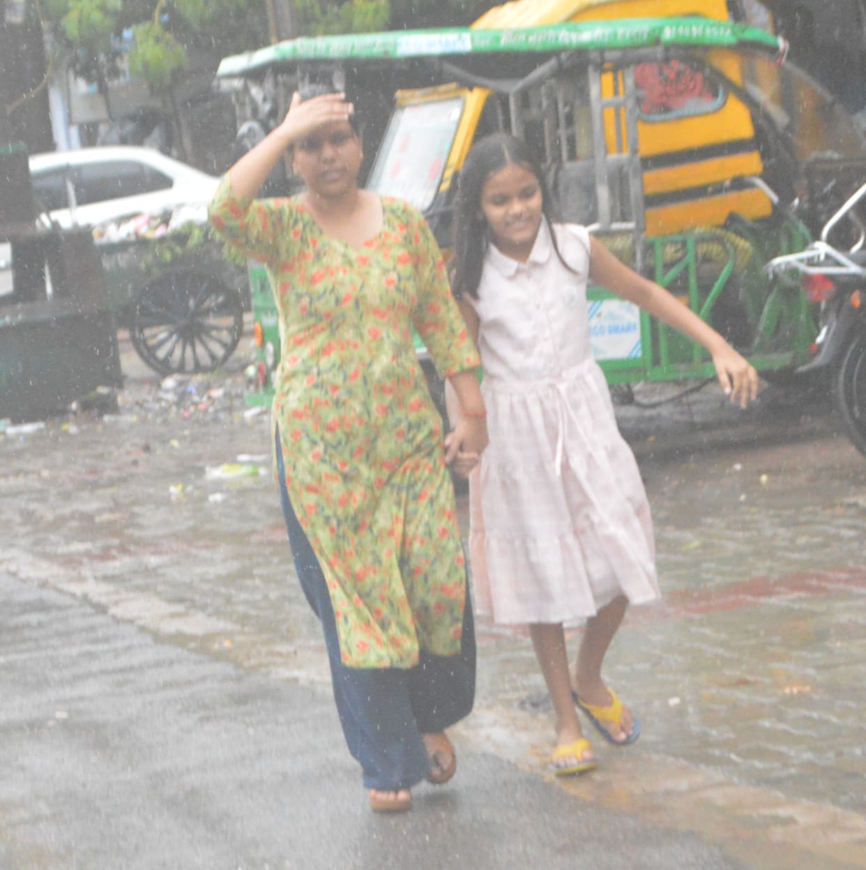 City reels under heavy monsoon rains; traffic grinds to a halt due to waterlogging.