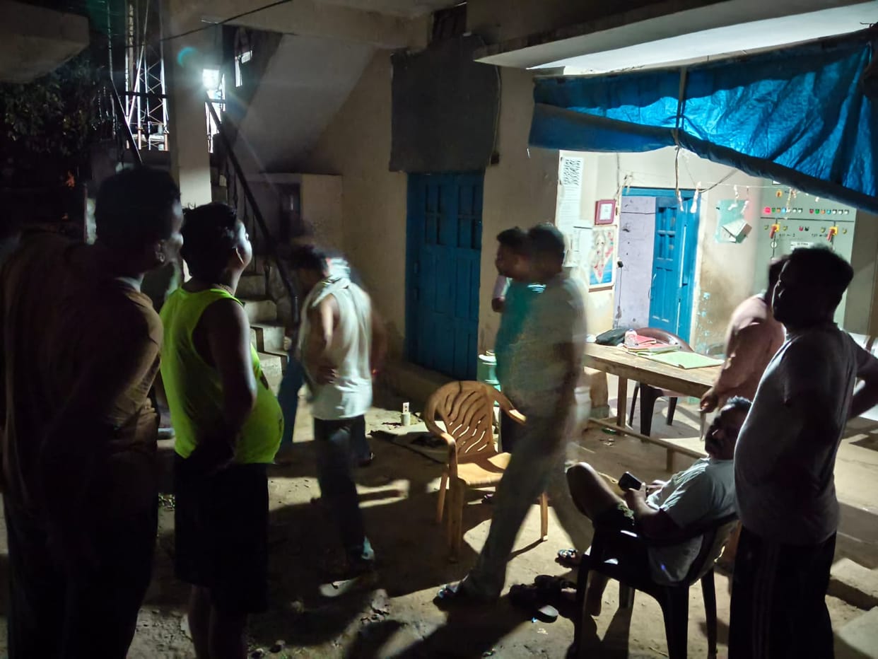 People angered by power cuts create a ruckus at the substation.