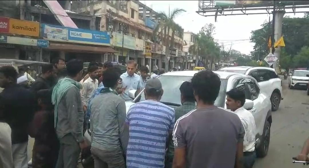 Speeding car runs over calf; locals save its life; heated argument ensues with the driver—a doctor.