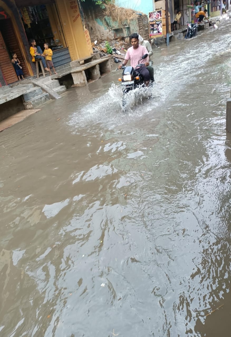 An hour of heavy rain brought relief from the humidity, while waterlogging exposed the flaws in the civic infrastructure.