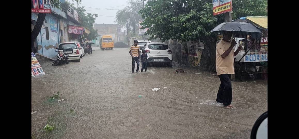Heavy rains pour down; farmers' faces light up with joy.