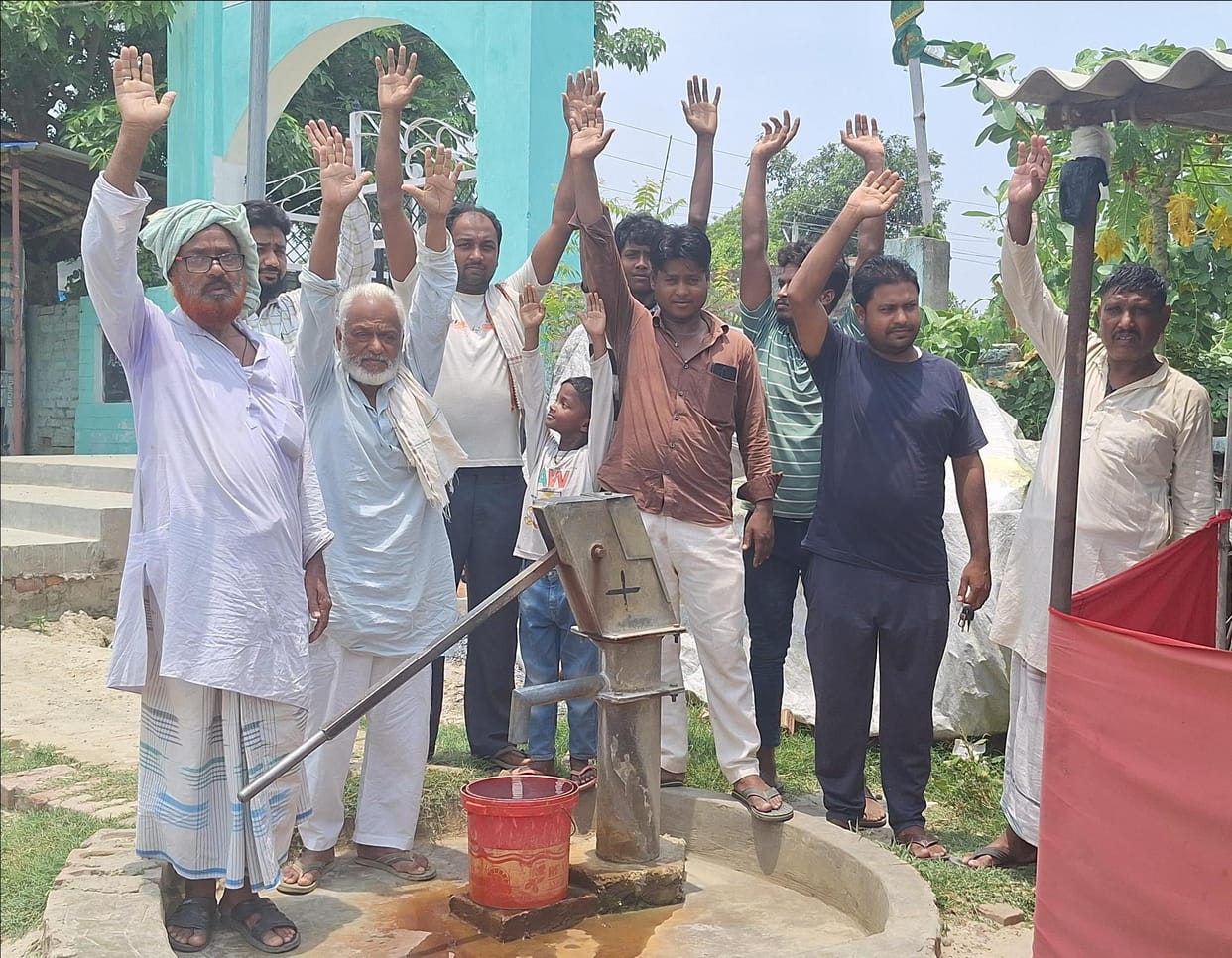Ants emerging along with water from handpump; protest held.