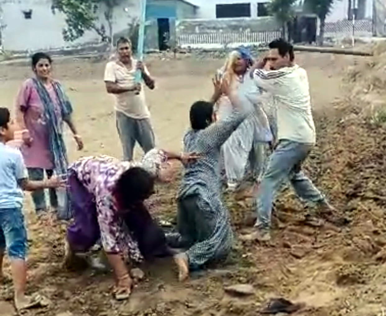 Woman subjected to a life-threatening attack after intruders entered the house located in the fields; husband and brother-in-law dismiss the allegations as baseless.