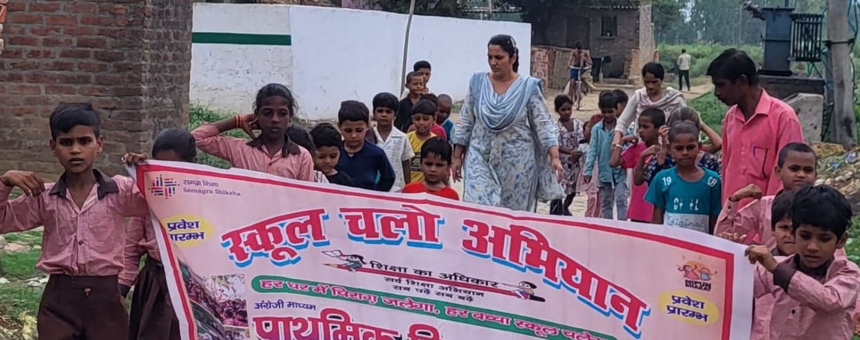 Children raised awareness about enrollment by holding a rally.