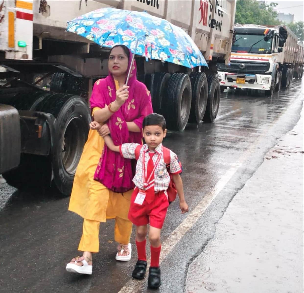 Students who arrived drenched were welcomed at the school.