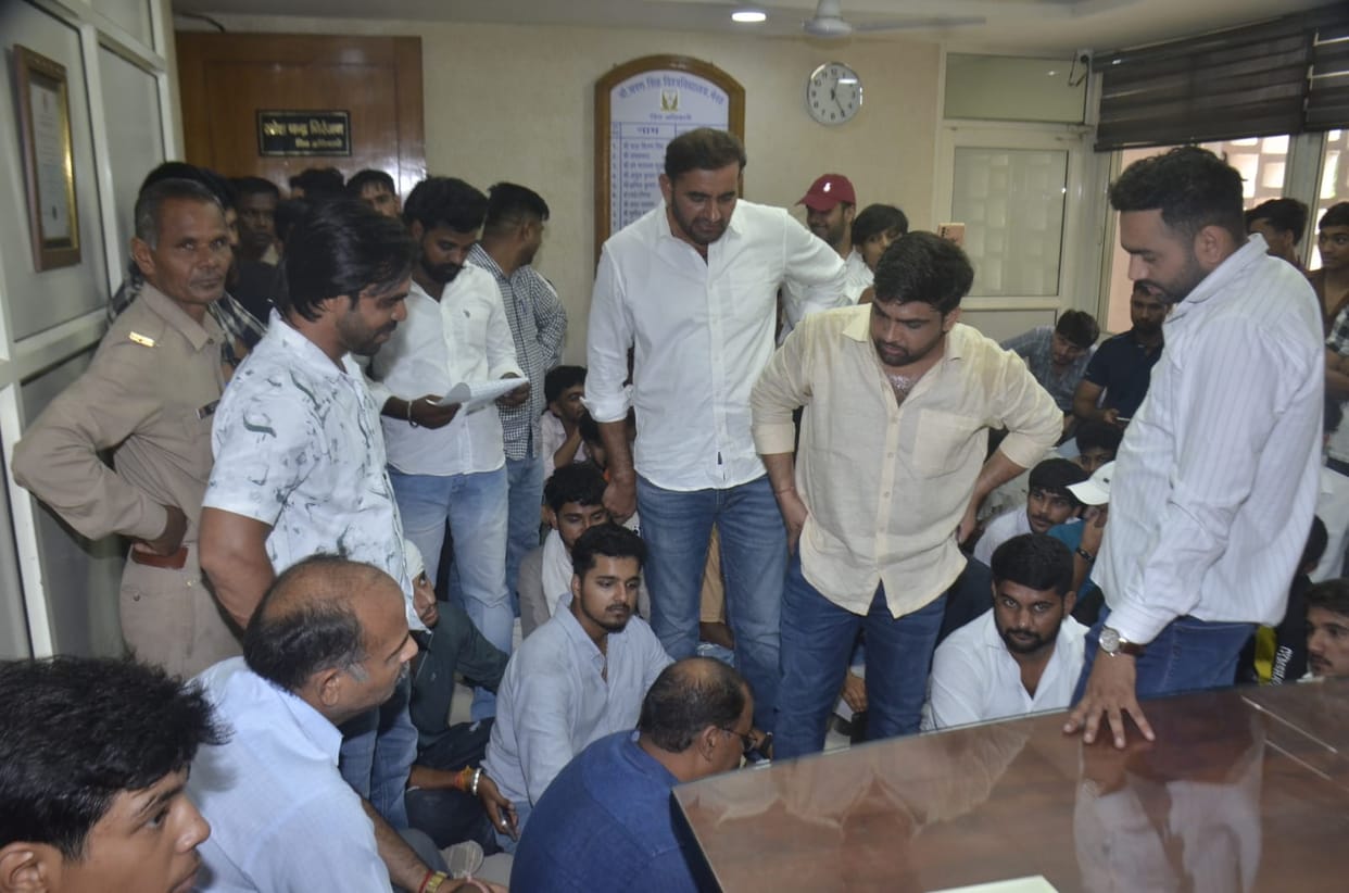Students gheraoed the Controller of Examinations at CCSU.