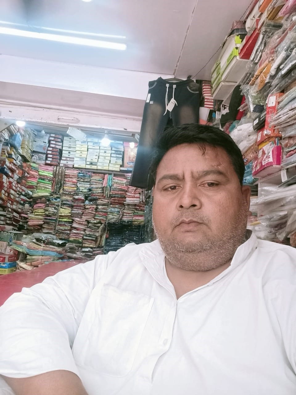 Businessman commits suicide by shooting himself after closing shop shutter.