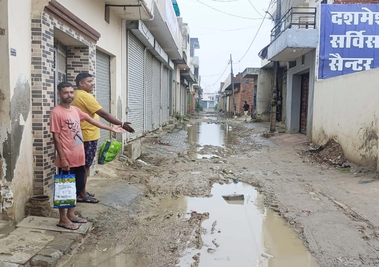 Road in bad condition due to waterlogging