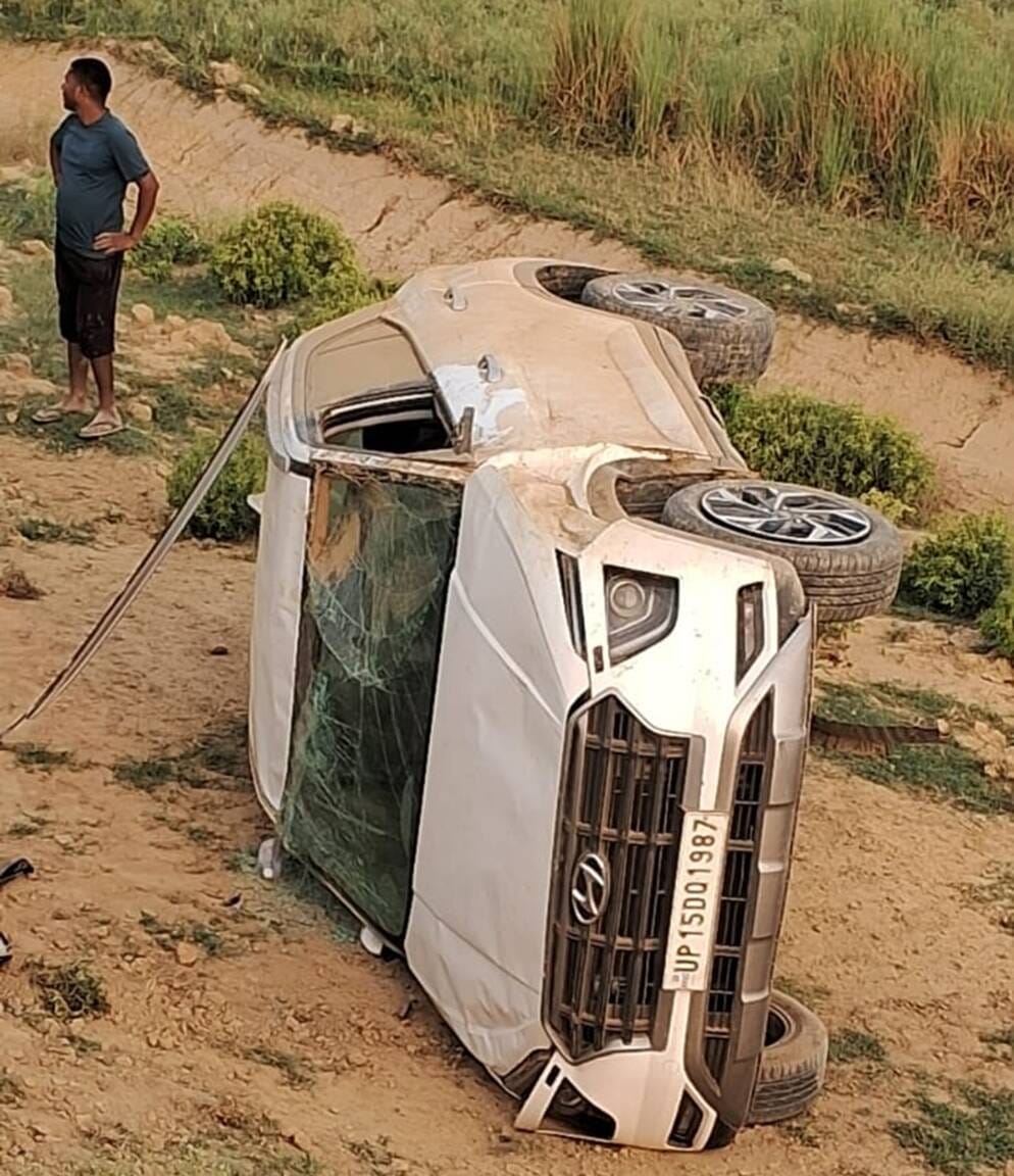 Collision between truck and trailer; driver injured.