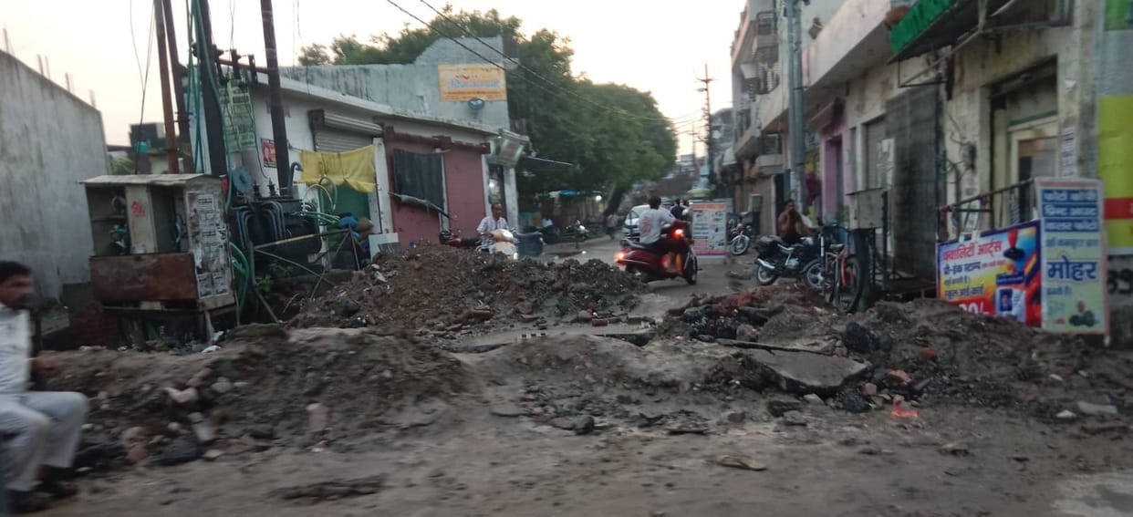 Roads were broken and drains opened to drain out water and provide relief from waterlogging.