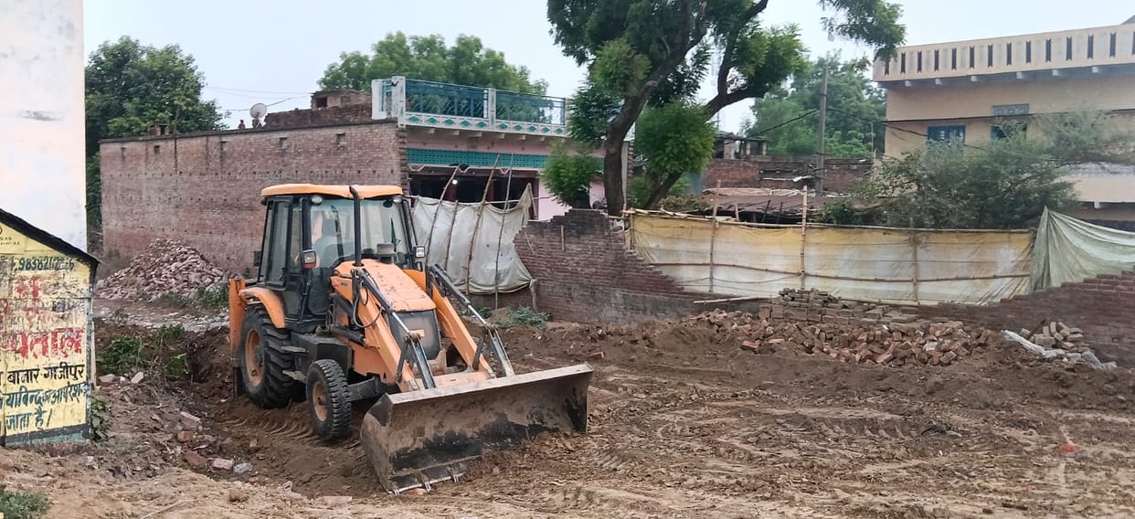 Demolition begins for the construction of an approach road; more than six houses vacated.