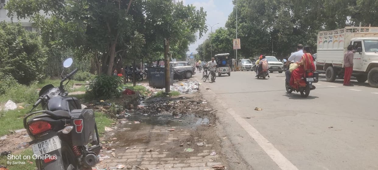 Footpaths missing; garbage and encroachments everywhere.