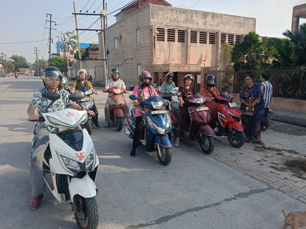 Women are taking flight towards self-reliance by learning to ride a scooty.